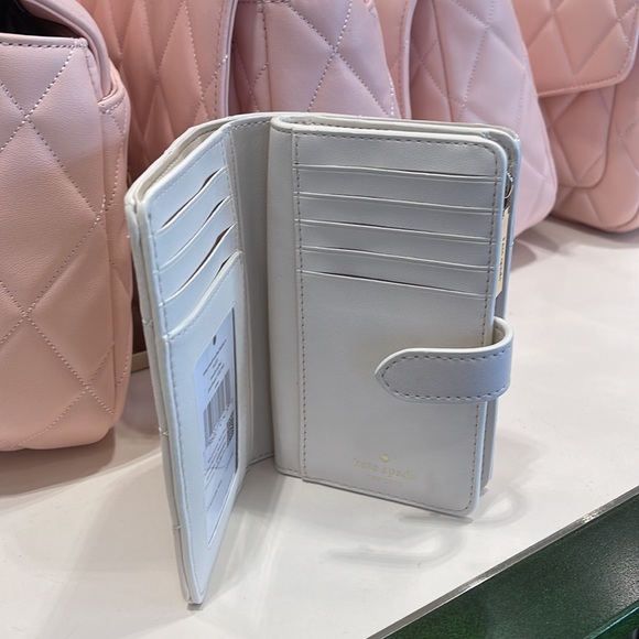Kate Spade Carey Medium Compartment Bifold Wallet 
COLOR: Parchment - Picture 14 of 16